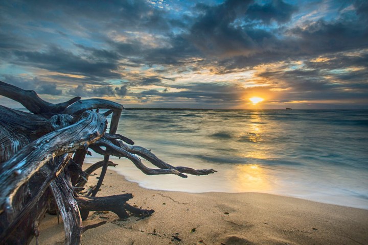 a sunset over a body of water