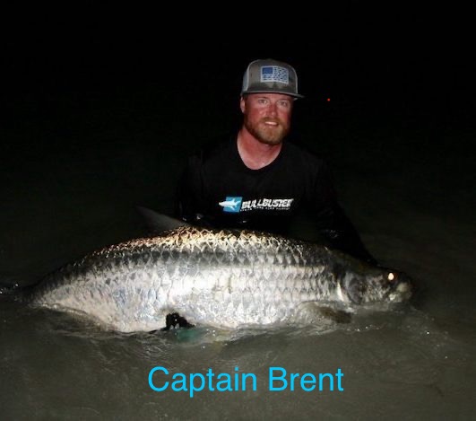 Captain Brent a man holding a fish
